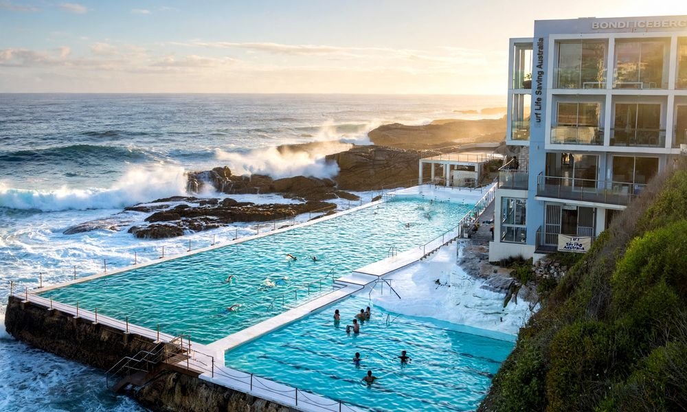 Bondi Icebergs ocean pool at the southern end of Bondi Beach with waves breaking over the rocks