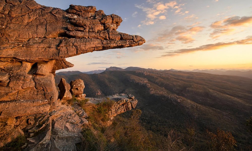 The Balconies rock formation jutting out over a valley in the Grampians at sunset