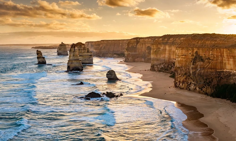 Twelve Apostles limestone stacks at golden hour on the Great Ocean Road