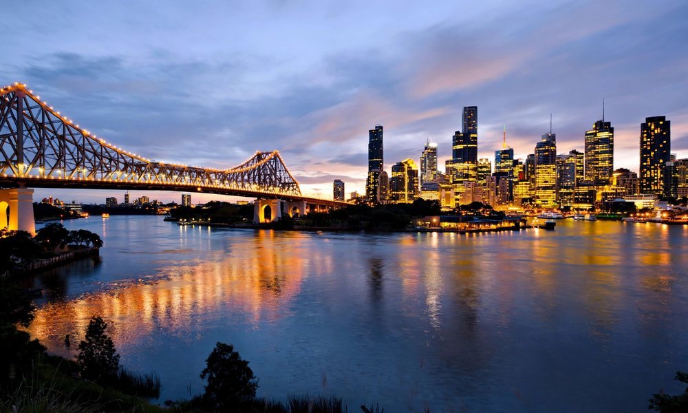 Brisbane city skyline along the Brisbane River at dusk