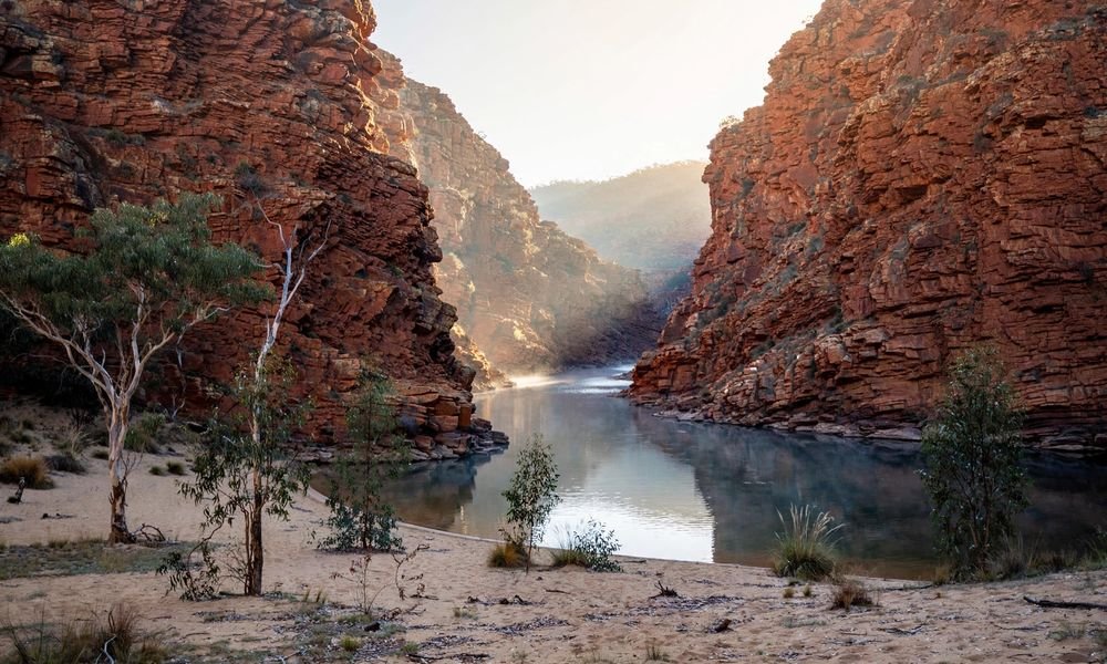 Red rock gorge with a calm waterhole in the West MacDonnell Ranges